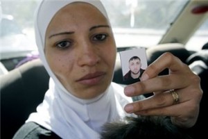 Palestinian seeks husband's body, held by Syria rebels